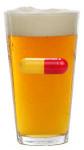 Bierglas met een pilletje